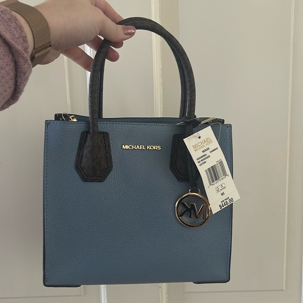 Light blue & brown Michael kids purse with detachable shoulder strap.